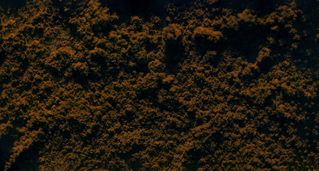 dim golden pigment abstract texture background