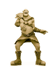 green orc cartoon is dancing