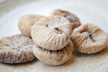 Dried fig fruit on on a plate on table 