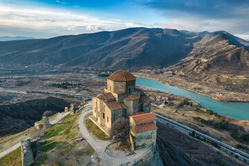 Amazing aerial view of Jvari monastery and the mountains in Mtskheta, Georgia