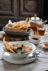 bakso malang is a traditional food Indonesia made from meatball, tofu, fried dumpings, rice noodle and beef soup
