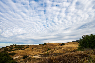 hilly landscape and clouds