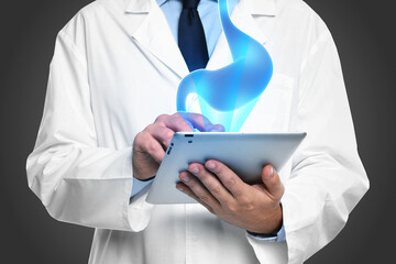 Symptoms and treatment of heartburn and other gastrointestinal diseases. Doctor using tablet on...
