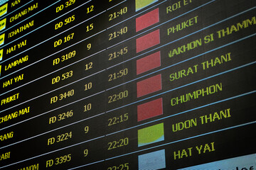 Flight itinerary at the airport information board