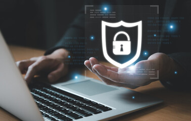 Entrepreneur or Business person using software and protection to keep data safe online when using...