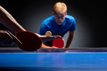Portrait of young man playing tennis