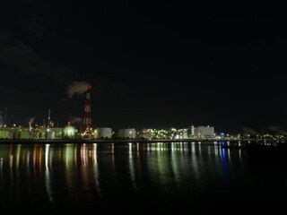 Fototapeta na wymiar Factory night view in Yokkaichi, Mie Prefecture