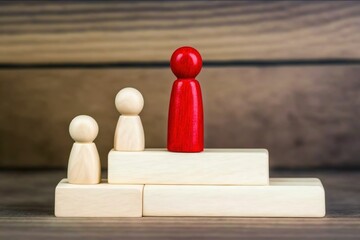 contest winner concept, wooden figures on wooden blocks, business contest winner