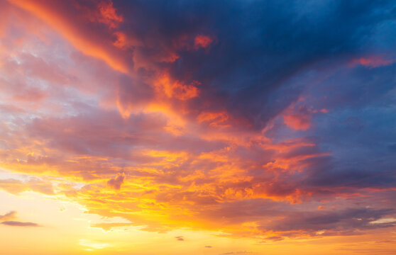 Utterly Spectacular Sunset With Colorful Clouds Lit By The Sun. Bright Epic Sky.