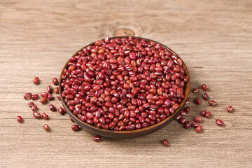 Azuki beans or red beans in wooden plate on  table