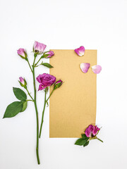Flowers composition. Frame made of rose flowers on white background. Flat lay, top view, copy space