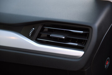  Close-up of the dashboard, adjustment of the blower, air conditioner. Elements of air conditioning and heating in the car. 