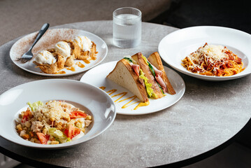 club sandwich with ham, cheese and vegetables