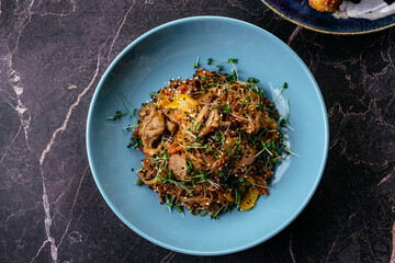 asian rice noodles with meat. vegetables. restaurant menu