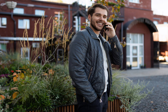 European Freelance Man Talking On The Phone On The Street