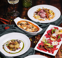 Carpaccio di manzo, Melanzane, Melanzana alla ricotta, Tar-tar with salmon and Vitello tonnato