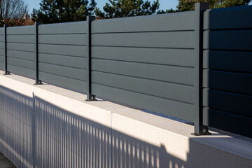 wall grey aluminum barrier and gray fence of private individual house modern new protect view home...