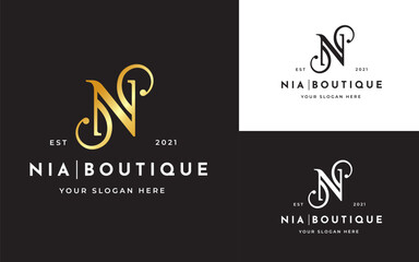 Fototapeta premium Creative letter N luxury golden logo design concept. Initial symbol for corporate business identity. Alphabet vector element