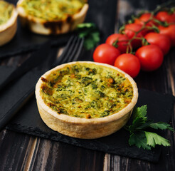 Quiche with spinach - traditional dish of french cuisine - obrazy, fototapety, plakaty