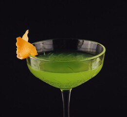 Apple martini coctail isolated on black background