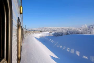 Gordijnen Poolcirkel Polar Express in Kiruna in winter scenery. Kiruna is city with iron ore mine. Sweden, Arctic Circle, Swedish Lapland  © Iwona