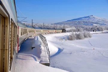 Foto auf Alu-Dibond Polar Express in Kiruna in winter scenery. Kiruna is city with iron ore mine. Sweden, Arctic Circle, Swedish Lapland © Iwona