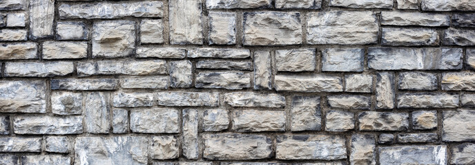 Natural grey stone brick wall texture background banner