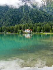 Fototapeta na wymiar Lake Anterselva, Italy. Amazing view of the famous lake Anterselva. Alpine lake. Picturesque mountain lake at Dolomites. Wonderful nature contest. Iconic location for photographers