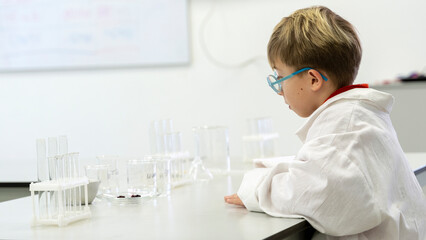 a chemistry student conducts chemical experiments in a chemical laboratory