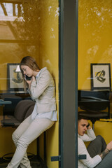 Two colleagues on the phone