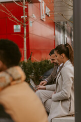 Laughing and looking at the tablet