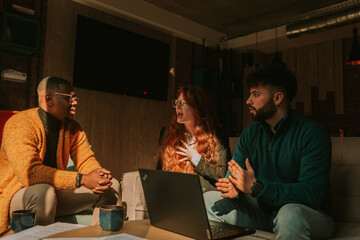 Ginger woman apologizing to her black male colleague after she did a big mistake at the project