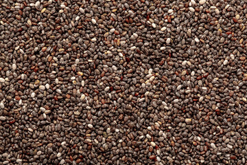 Chia seeds close up. Chia seeds macro. Dry healthy supplement for proper nutrition.