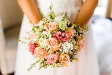 Bride holds Wedding Bouquet