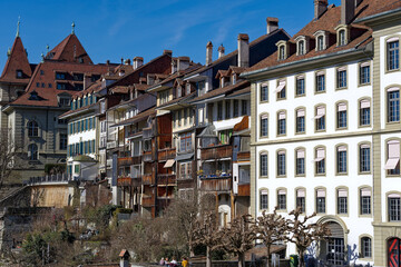 Scenic view of historic houses at the old town seen from Minster Terrace at the Swiss City of Bern on a sunny winter day. Photo taken February 21st, 2023, Bern, Switzerland.
