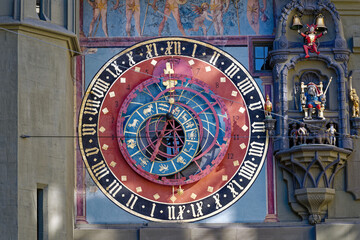 Fototapeta na wymiar Close-up of clock face of clock tower named Zytglogge at the old town of Bern on a sunny winter day. Photo taken February 21st, 2023, Bern, Switzerland.