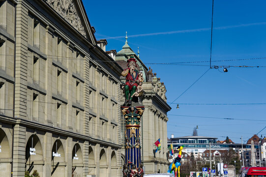 Ogre sculpture (Kindlifresser) at fountain in the old town of Bern, capital of Switzerland, at Grain House Square on a sunny winter day. Photo taken February 21st, 2023, Bern, Switzerland.