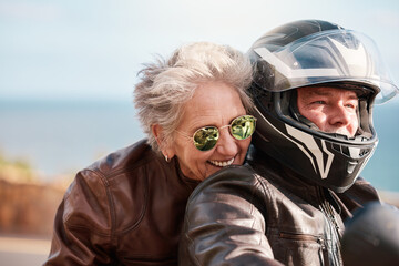 Motorcycle, travel and senior couple on road trip for adventure, freedom and enjoying weekend in retirement. Love, summer and man and woman ride on motorbike for holiday, vacation and journey by sea