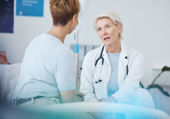 Woman, doctor and talking to patient for healthcare, clinic services and advice of wellness,...