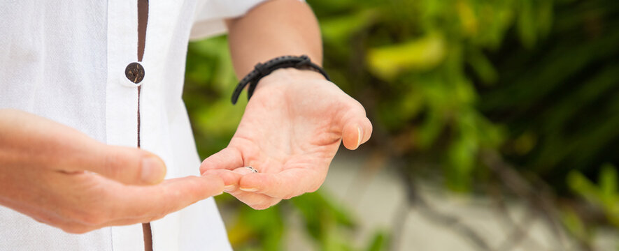 woman doing qigong on beach