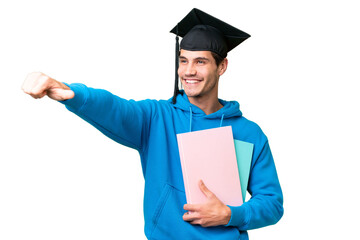 Young university graduate man over isolated background giving a thumbs up gesture