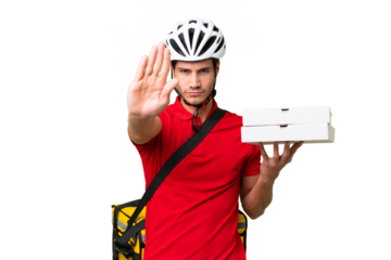 Pizza delivery man with work uniform picking up pizza boxes over isolated background making stop gesture