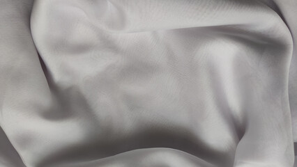 Fototapeta premium Abstract chiffon fabric background white texture from the waves and the irregularities that create the frame. Light, delicate, beautiful curtains