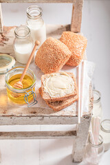 Homemade buns with honey served with milk.