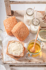 Sweet buns with honey in the morning in farm.