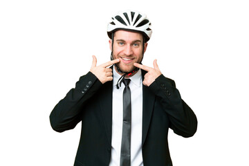 Business person with a bike helmet over isolated chroma key background giving a thumbs up gesture