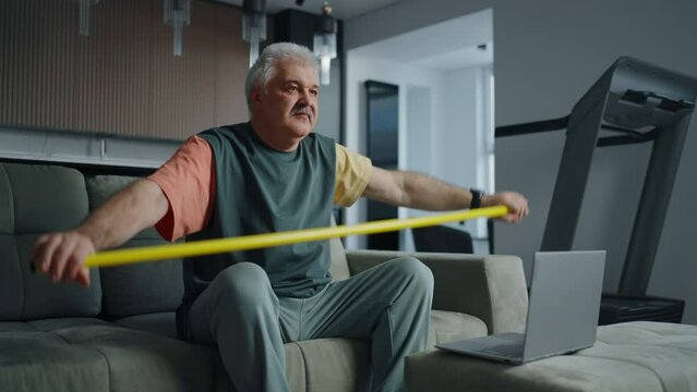 Home Fitness For Senior People, Mature Man Doing Physical Exercise With Stick For Health Of Spine