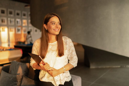 Young smiling charming business woman