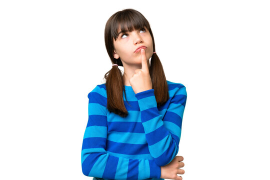 Little caucasian girl over isolated background having doubts while looking up