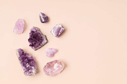 Healing reiki chakra crystals therapy. Alternative rituals with amethyst and rose quartz for wellbeing, meditation, relaxation, mental health, spiritual practices. Energetical power concept
